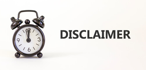 Disclaimer symbol. Concept word Disclaimer on beautiful white paper. Beautiful white paper background. Black alarm clock. Business disclaimer concept. Copy space.