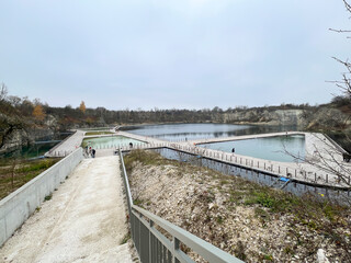 Zakrzowek Reservoir, swimming pool - artificial water reservoir in Krakow in Zakrzowek in autumn in cloudy weather. It was created in 1992 after flooding an old limestone quarry