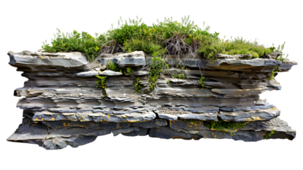 Rocky cliff with textured sedimentary layers and patches of green vegetation at the top isolated on white background