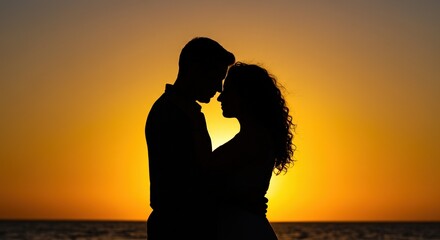 silhouette of a couple kissing