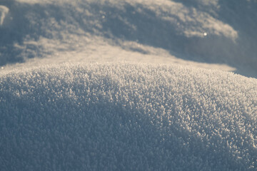 A picturesque winter scene of snow in a rural area, featuring both modern and retro elements in a serene natural setting.Christmas, Holidays, Childhood, Crystals, Ice