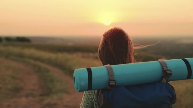 girl with backpack traveling at sunset, hiking person, lidi adventure nature, finding peace in sunsets, a girl with a backpack travels at sunset, backpacker on the horizon, the allure of the sunset