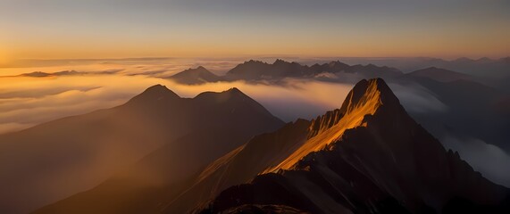 A breathtaking sunset over a mountain range where the last rays of sunlight kiss the peaks casting a golden glow