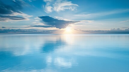 Obraz premium Serene seascape with reflective water surface.