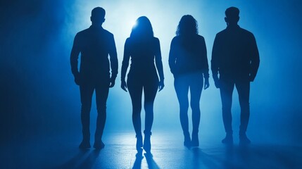 Silhouettes of four people in dramatic lighting.