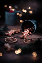 vertical image, cute gingerbread cookies and Christmas decorations.