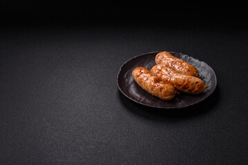 Grilled sausages with spices and herbs