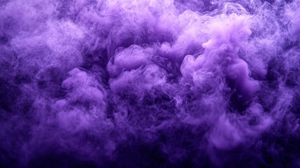 Obraz premium Abstract purple smoke swirls on black background.