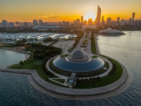 Chicago's Adler Planetarium at sunset, viewed from above. City skyline in background. Peaceful, tranquil scene. Adler Planetarium, Chicago, Illinois, United States