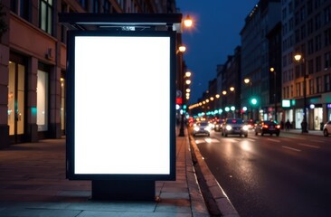 Blank white vertical digital billboard poster on spring city street bus stop sign at night. Street advertising bus stop mockup 