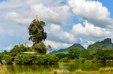 Kyauk Ka Lat Pagoda, it is near Hpa-an, the capital of the Kayin-State, Myanmar. It is a popular travel destination, a rock like a needle.