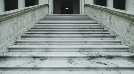 Obraz premium Grand marble staircase leading to a dark doorway.