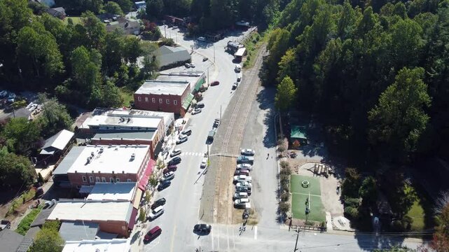 Aerial flyover of the downtown area of the small town of Saluda, North Carolina in the Blue Ridge Mountains.
