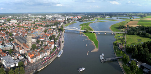 Obraz premium Aerial view of the Ijssel river and the city of Deventer, The Netherlands