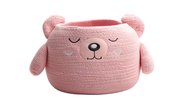 Pink teddy bear-themed textured storage basket with a cute face design, rounded ears, and a friendly expression, perfect for adding charm to nursery decor. Isolated on white background. 