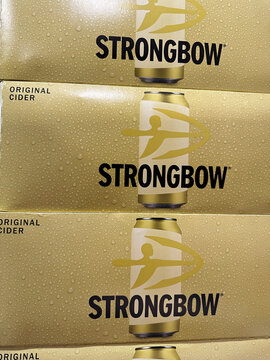 Chandlers Ford, Eastleigh, Hampshire, United Kingdom, October 6 2024. Stack of boxes of Strongbow ciders, packaging for cans of cider.