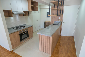 Cocina kitchenette moderno con muebles de melamina