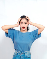 Asian woman showing shocked face expression isolated white backgroud