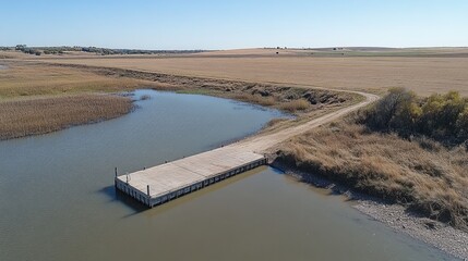 Tranquil Dock on Calm Water Surrounded by Serene Landscape