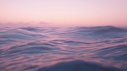 Obraz premium Serene Ocean Waves at Sunrise Pink Hues Peaceful Waterscape