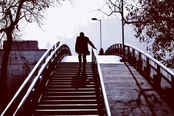Man crossing a bridge 
