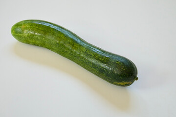 Fresh cucumber on white background