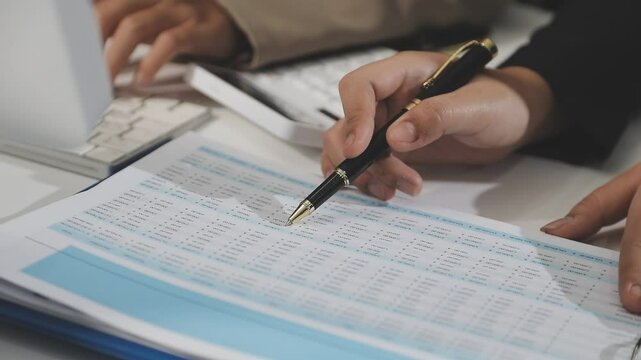 Accounting company provide finance and taxation planning for profitable cash flow, Auditor and accountant team working in office, analyze financial data and accounting record with calculator.Insight