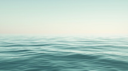 Fototapeta premium Calm and serene seascape with gentle waves extending to the horizon at dawn
