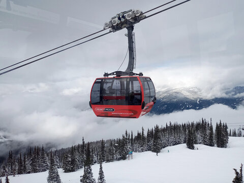 British Columbia, Whistler, Canada - Mar 16 2022: The Peak 2 Peak Gondola is a tricable gondola lift at Whistler Blackcomb Resort in Whistler, British Columbia, linking Whistler Mountain's Roundhouse