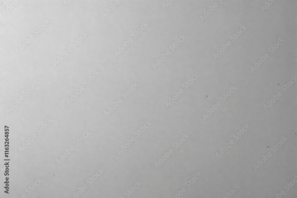 Poster plain light gray textured surface with small specks, minimalistic and clean background, suitable for