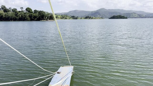Excursion boat cruising on the reservoir Presa de Hatillo near Cotui in the S&aacute;nchez Ram&iacute;rez province of the Dominican Republic