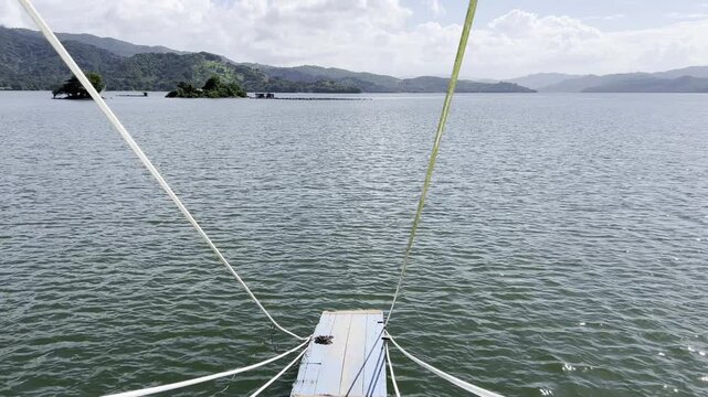 Excursion boat driving through the reservoir Presa de Hatillo near Cotui in the S&aacute;nchez Ram&iacute;rez province of the Dominican Republic