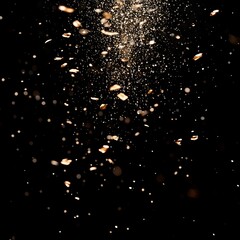 Golden Particles Falling on Black Background
