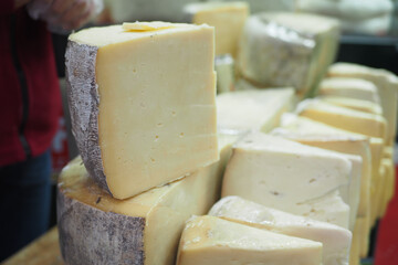 slice of cheese selling at local market 