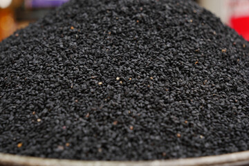 Close-Up of Black Sesame Seeds in a Market Display