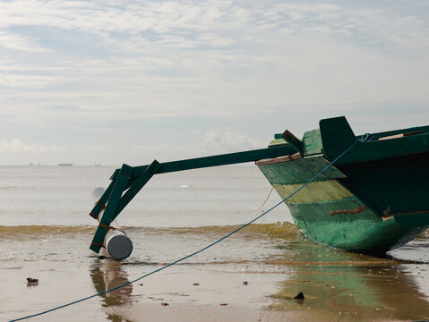 Wooden boat on the beach, Fishing boats on the shore of the White Sea  on a bright sunny day.