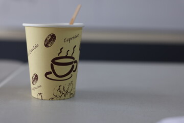 cup of coffee expresso with stirrer 