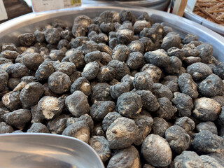 A view of a large bin of dried maca, on display at a local Chinese health food store.