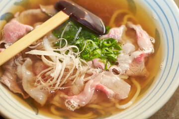 Boiled udon noodles in a bowl