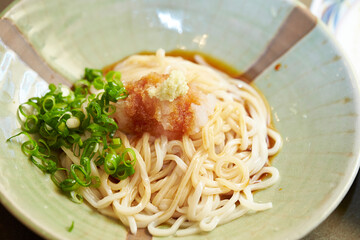 Boiled udon noodles in a bowl