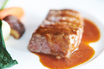 Steak with sauce on a plate