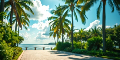Fototapeta premium Tranquil Pathway Leading to a Serene Ocean View, Framed by Lush Tropical Foliage