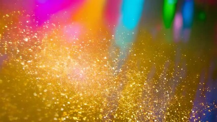Gold glitter particles with bokeh. Colorful lights on background. Holiday or event decoration. Festive design for intro, outro, video background.