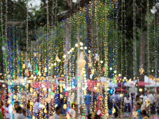 Naklejka premium cable of string led lights on tree in the garden at night time used for decorating for beauty According to important festivals