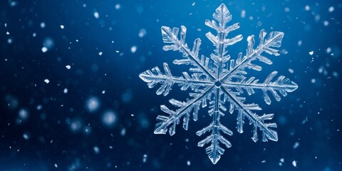 Intricate snowflake design against a blue background with falling snowflakes