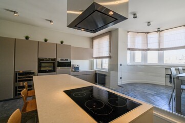 interior apartment kitchen and dining room, refectory area, cooking equipment, table furniture,...