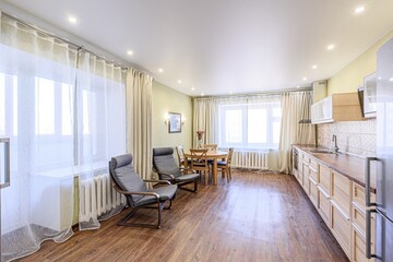 interior apartment kitchen and dining room, refectory area, cooking equipment, table furniture, stove