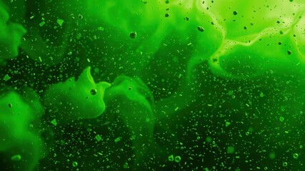 Abstract Green Fluid with Floating Particles and Glowing Effects