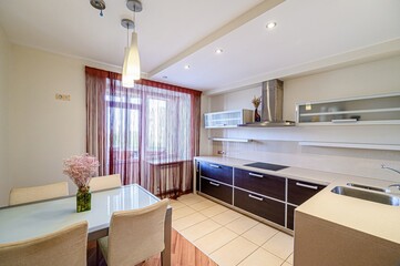 interior apartment kitchen and dining room, refectory area, cooking equipment, table furniture, stove