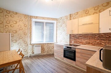 interior apartment kitchen and dining room, refectory area, cooking equipment, table furniture, stove